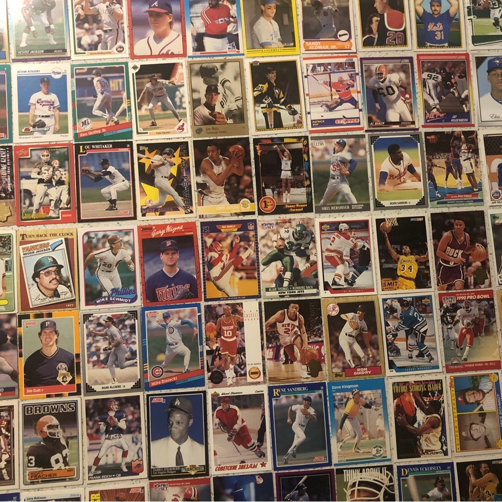 77 Sports Cards Deion Sanders Saquon Barkley Mike Schmidt Nolan Ryan Joe Sakic